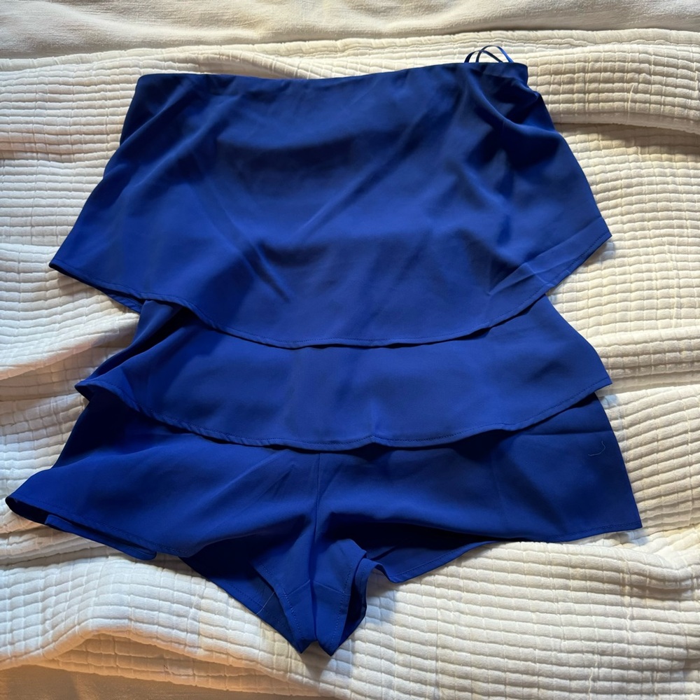 Mini romper with ruffle